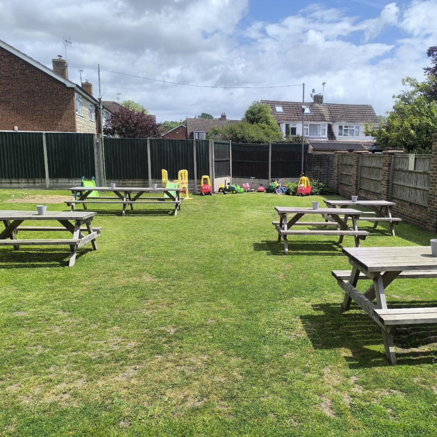 Spacious beer garden at The Dukes Head, a country pub in Hamstreet Kent, with outdoor seating and family-friendly space
